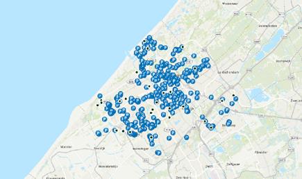 A geospatial overview of the Hague, indicating the tested areas of accessible parking spots with blue dots.