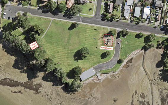 Te Pua Keith Park as viewed from the air. Distance between the existing toilet block and playground is highlighted with no easy route between the two.